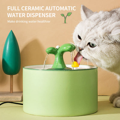 PetTime automatic electric ceramic water dispenser for pets, showing a sleek ceramic bowl with flowing water and electronic control features.