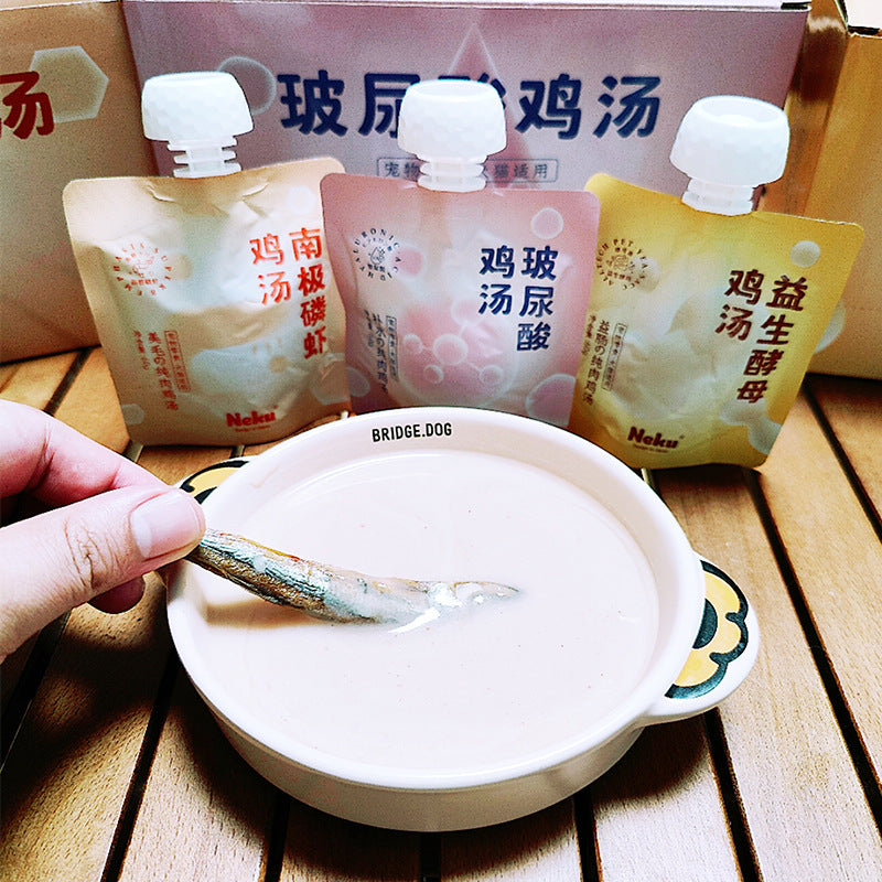 PetTime NEKU Cat Nutritional Chicken Broth pouch with a close-up view of the packaging and chicken broth contents in the image.