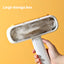 PetTime double-sided pet hair removal brush with textured surfaces for effective fur removal from furniture and clothes.