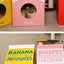 PetTime cat cardboard house with milk carton scratch board, featuring a cozy, interactive feline play and scratching surface.