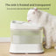 PetTime multifunctional automatic water dispenser for pets, showing the sleek design and water outlet in a clean setting.