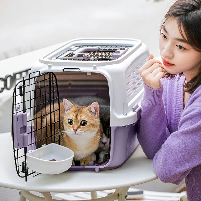 Portable PetTime cat cage with metal bars and handle for easy transport on a compact, secure enclosure for cats.